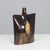 A striking hand-built ceramic sculpture-vase, signed TL, representing the expressive depth of postwar European studio...