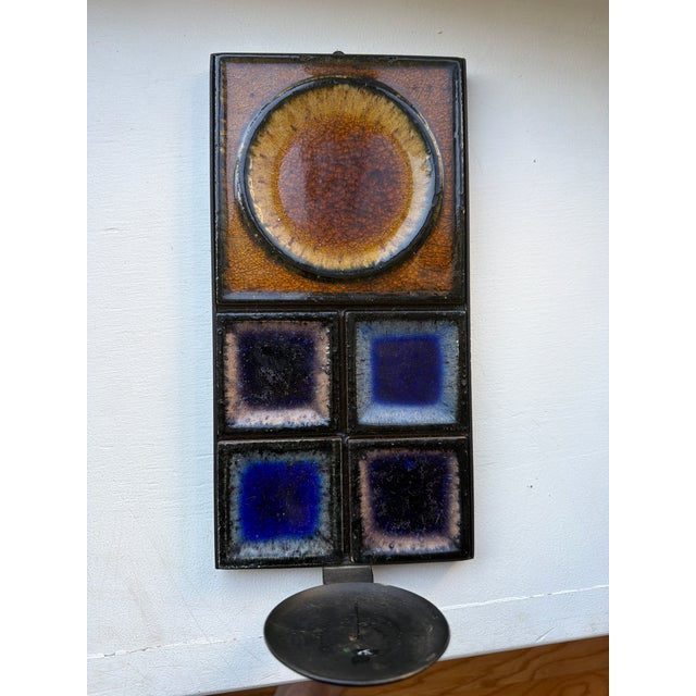 A stunning candle sconce by Norwegian designer Konrad Galaaen (1923-2004) for Porsgrund Porcelain This dual-function piece...