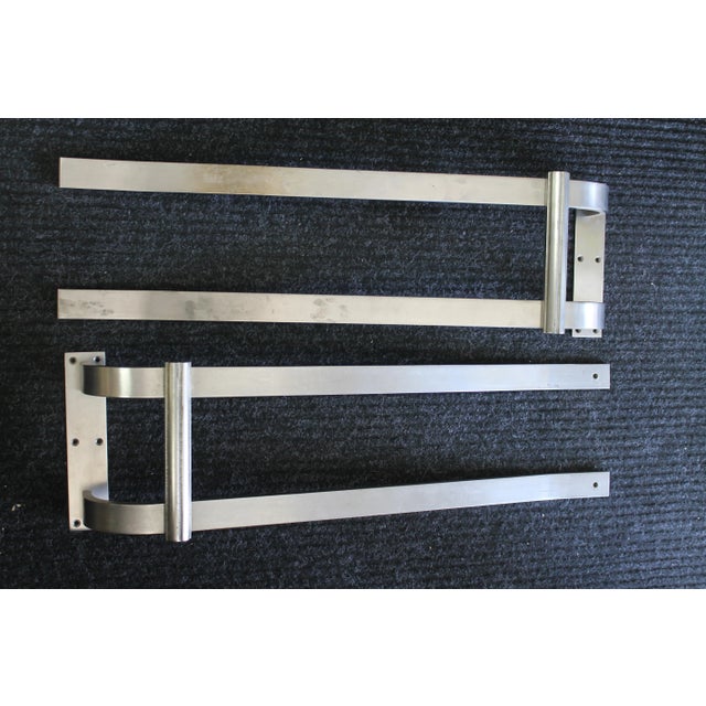 Monumental pair of steel door pulls. Each door pull measures 9" wide, 5" deep and 30" high.