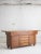 A late mid century Italian sideboard / credenza attributed to Mobil Girgi. A heavy and substantial wood piece featuring...