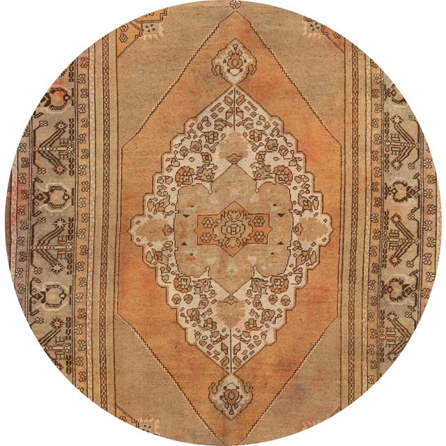 This beautiful antique Khotan hand-knotted design rug will make your floor look splendid. This collection is made of wool....