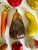 Here is a wonderfully unusual mid-20th century collection of 14 hand-painted papier-mâché vegetables. Individually formed...