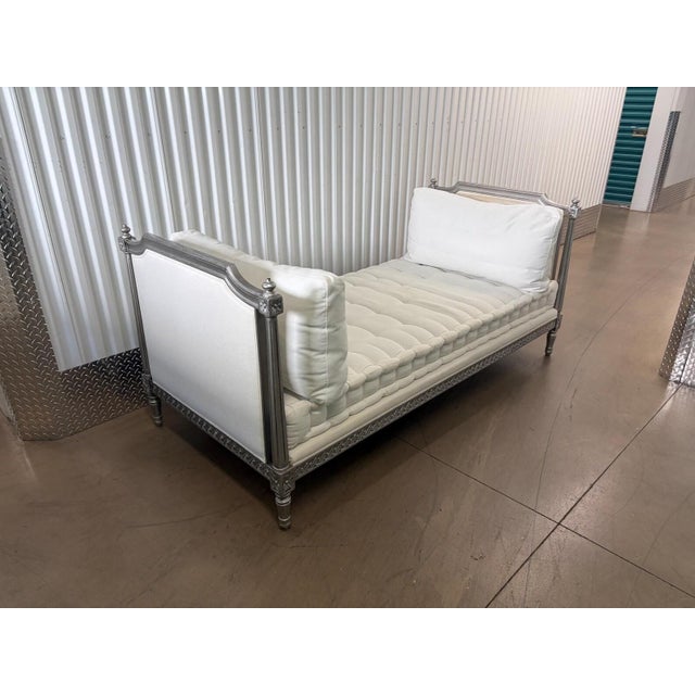This is a fabulous hand carved wood French Louis XVI daybed by Oly studio. it features the manufacturer brass tag as...