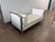 This is a fabulous hand carved wood French Louis XVI daybed by Oly studio. it features the manufacturer brass tag as...
