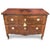 An 18th-century Emilian chest of drawers, with two gently contoured drawers and entirely veneered in walnut, walnut burl,...