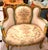 Create an atmosphere of timeless romance with this exquisite French Louis XV Loveseat Sofa, a luxurious statement piece...
