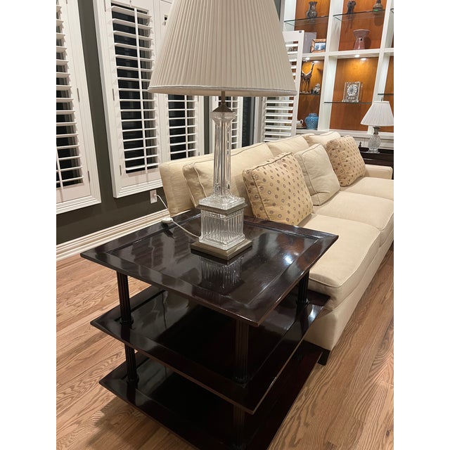 Gorgeous three-tier side table! The piece has four fluted columnar supports and tapered block feet. The top surface is...