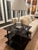 Gorgeous three-tier side table! The piece has four fluted columnar supports and tapered block feet. The top surface is...