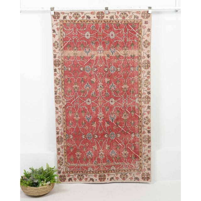 Vintage Turkish Hand-Knotted vintage rug is a semi-antique vintage Area rug.'70s Eastern region of Turkey's unique rug is...