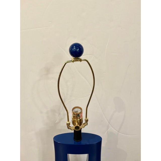 Stylish Currey & Co Modern Lamp. Sculptural blue body on black square base. Showroom floor sample.