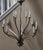 Sleek traditional or modern - extraordinary lines in a patina brass finish. Individual candles can accommodate shades for...