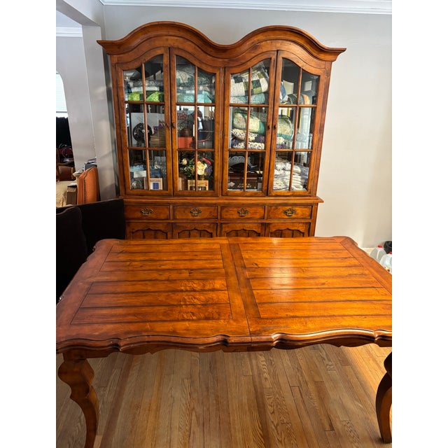 Dining table from Century Furniture Company's Town and Country Collection ("Gathering Table"). Original finish: Amaretto....