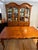Dining table from Century Furniture Company's Town and Country Collection ("Gathering Table"). Original finish: Amaretto....