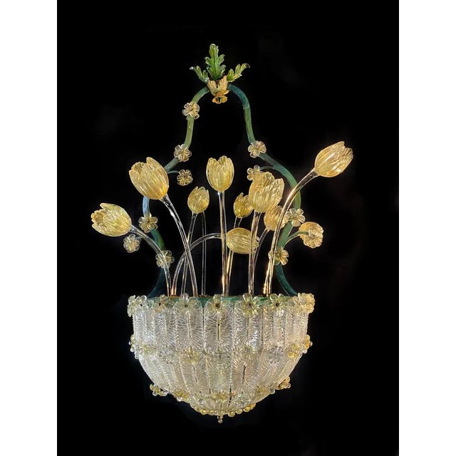 Incredibly beautiful chandelier attributed to the renowned Barovier & Toso. A helmet of glasses adorned with roses and...