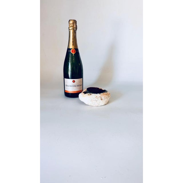 1960s Italian Freeform Onyx Ashtray, Polished Stone with Dark Brown, White, and Pink Veining : This exquisite freeform...