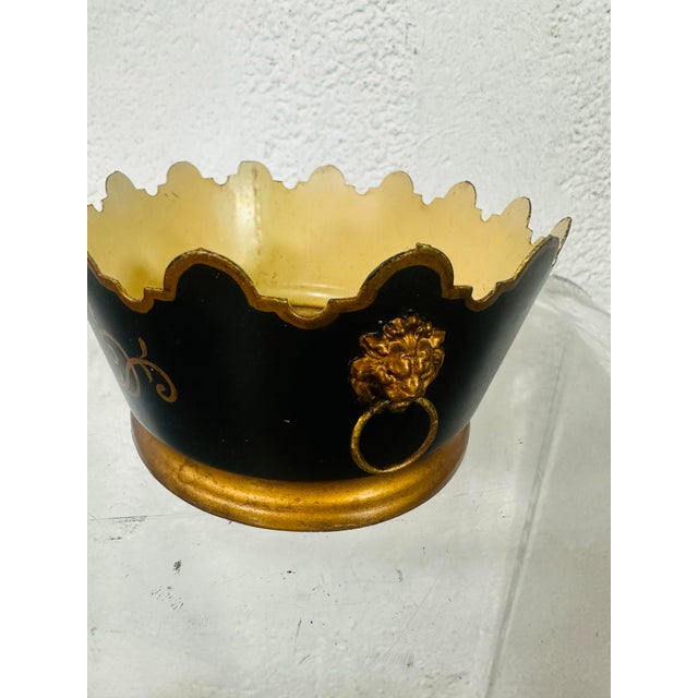 This is a beautiful and elegant French metal cachepot (or tole jardinière) — a decorative piece with both charm and...