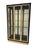 This impressive black lacquer and brass display case exemplifies the luxurious, architectural styling popularized by...