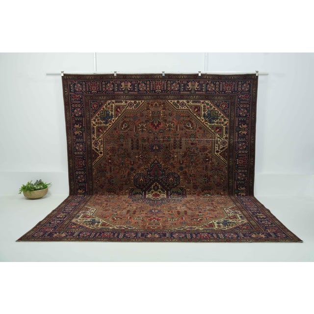 Vintage Persian Hand-Knotted area rug is a semi-antique vintage area rug. The '70s Eastern region of Persia's unique rug...