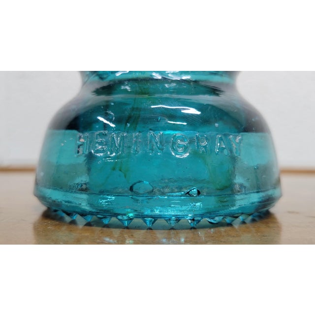 This is a gorgeous aqua vintage glass Hemingray insulator. Made in U.S.A. Patent May 2, 1893. Several insulators in stock...