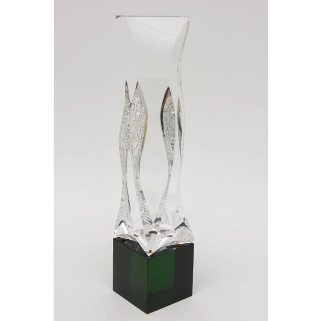 This unsigned vintage clear and pebbled lucite sculpture sits on a green lucite base that is not attached. From the 80;s...