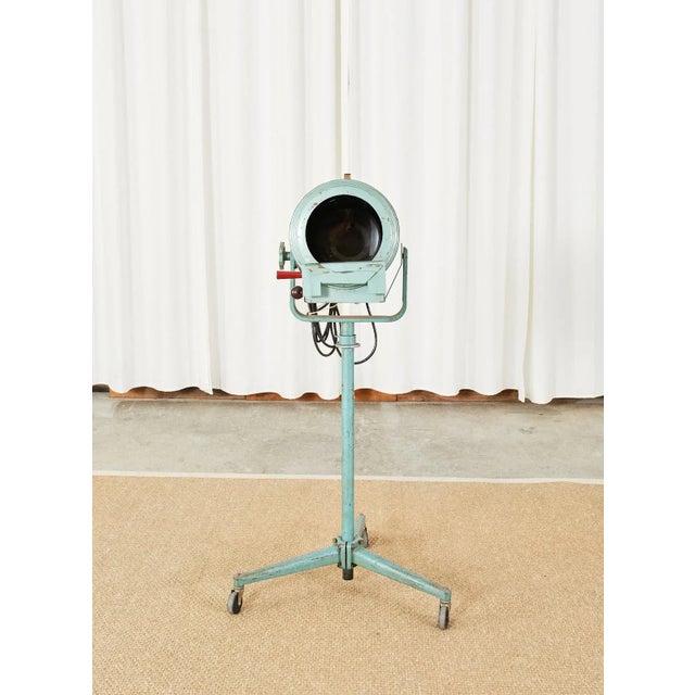 Industrial style Mid-Century Modern strong Trouperette theater stage spotlight mounted on a tripod iron Stand. As found...