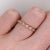 This is an eternity diamond band ring in which the diamonds extend all the way around the band. This dainty diamond band...