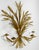 Stunning large gilt metal Tole sheaf of wheat wall sconce featuring two candle holders. Marked Made In Italy with tag....
