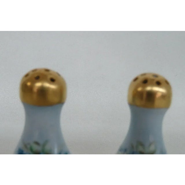 This lovely set of porcelain / ceramic salt and pepper shakers are stamped on the bottom " O & EG Austria ", see pictures,...