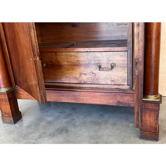 Secretaire a abattant, France circa 1820, Biedermeier period. The outside with fall front and two drawers flanked by two...