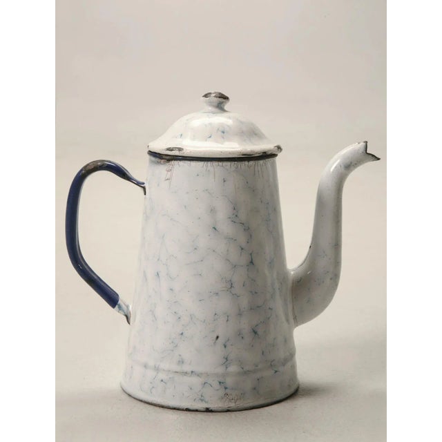 Not a morning person? The simple elegance of this vintage enamelware coffee pot is enough to get you out of bed. The...