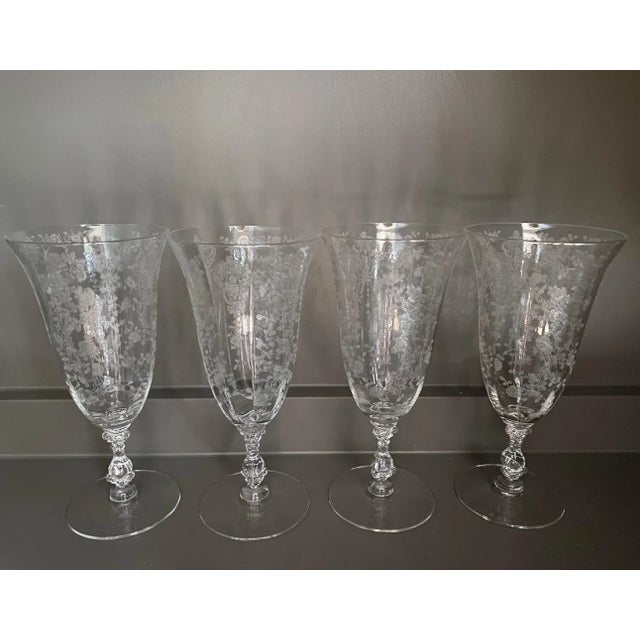 Beautiful set of 13 vintage floral etched wine and cocktail glasses with intricate scrolling stems. 3 different sizes...