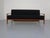 Sofa that converts into a daybed, featuring the original storage compartment by Carl Straub from the 1950s. When unfolded,...