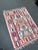 Design Plus Gallery presents a 3ft 7in × 5ft Handwoven Kilim Rug. This flatweave rug displays a coral-red field with...