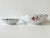 A set of antique hand-painted European porcelain bowls, early 20th century. The set includes a wide and shallow serving...