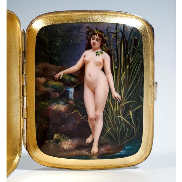 Exquisite rectangular silver cigarette case with a smooth finish and a double lid: Beneath the simple, smooth lid lies a...