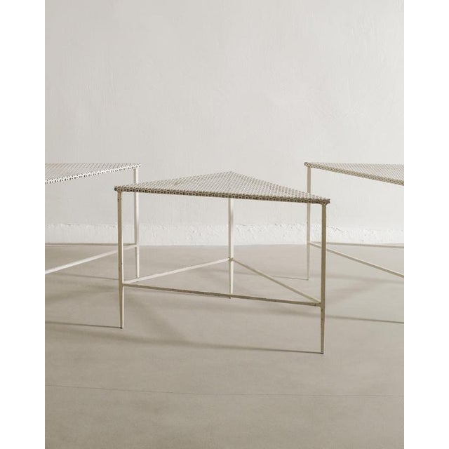 Rare set of three French mid century triangled side tables in white lacquered metal by Mathieu Matégot produced in France,...