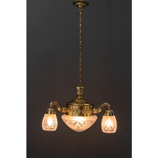 Historistic chandelier with original cut glasses vienna around 1890s Brass polished and stove enameled Original glass...