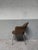 The brown chair is has a woolen fabric. The fabric is in good condition but it smells musty. Small signs of use on the...