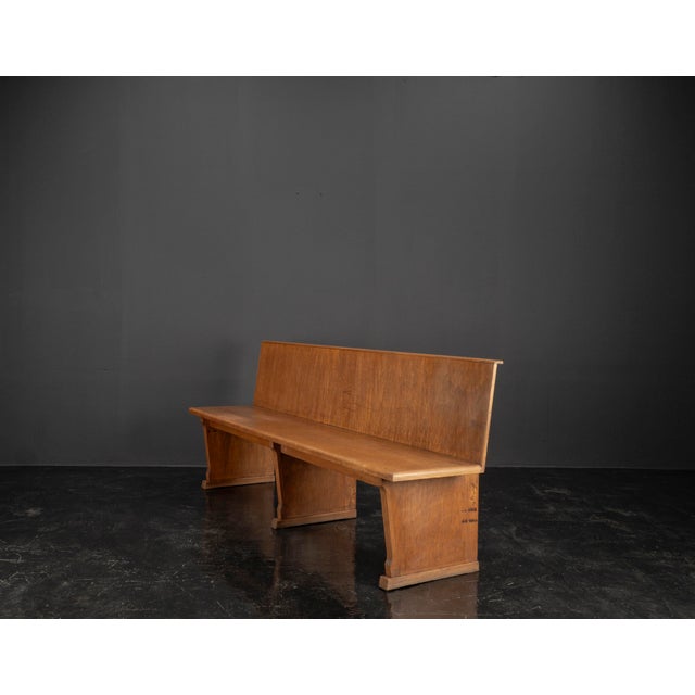 This simple, authentic wooden bench originates from a courtroom in the Cologne District Court and was crafted in the...