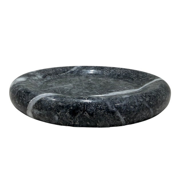 Handcrafted from richly veined grey marble, the Casa Catchall Dish is defined by its low circular profile, softly rounded...