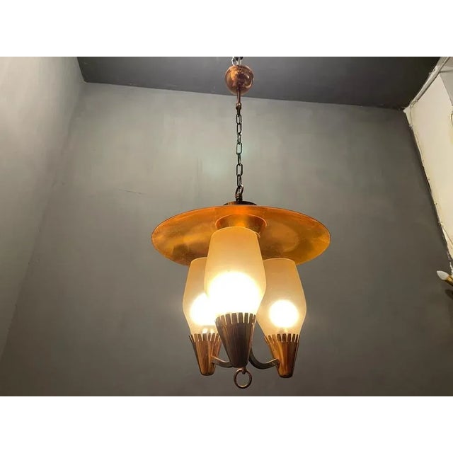 Copper light pendant 1960’s Matt fume glass shades with a black mat and copper frame. Height including chain and ceiling...