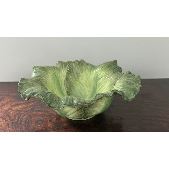 Majolica cabbage leaf serving or salad bowl. Realistic leaves folding out to a bowl. Nice medium size measuring 13” wide,...