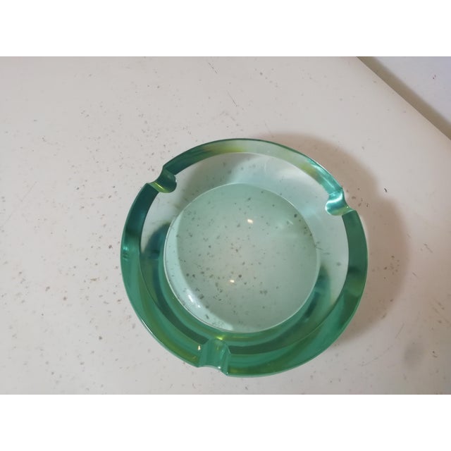 Green cut glass ashtray designed by Pietro Chiesa for Fontana Arte. A very elegant piece with high-quality, thick glass....