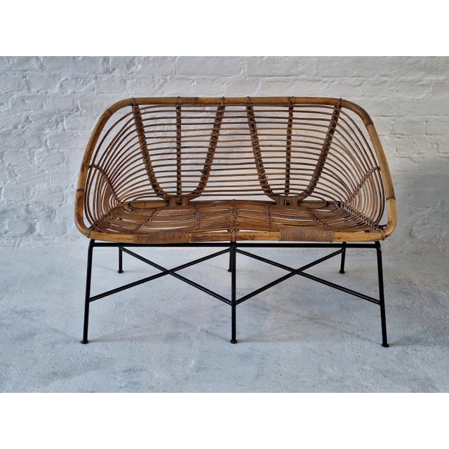 Italian mid century 2-seater sofa, bamboo on an iron frame.