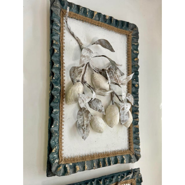Celebrate organic beauty with this unique wall sculpture, featuring lemons tree branches crafted in layered paper mache....