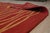 Trendy Sloane Red Flatweave Wool Rug, Country of Origin: China. This striking flatweave piece offers a bold, contemporary...
