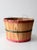This vintage apple orchard bushel basket features light wood paneling with slender red and green binding strips and small...