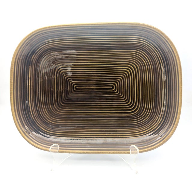 Offered is a vintage, circa. 1960s to 1970s oblong stoneware serving platter. There is no maker's mark or label on the...