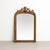Antique Napoleon III Style Gilded Wood and Stucco Mirror, Early 20th Century Enhance your decor with the timeless...