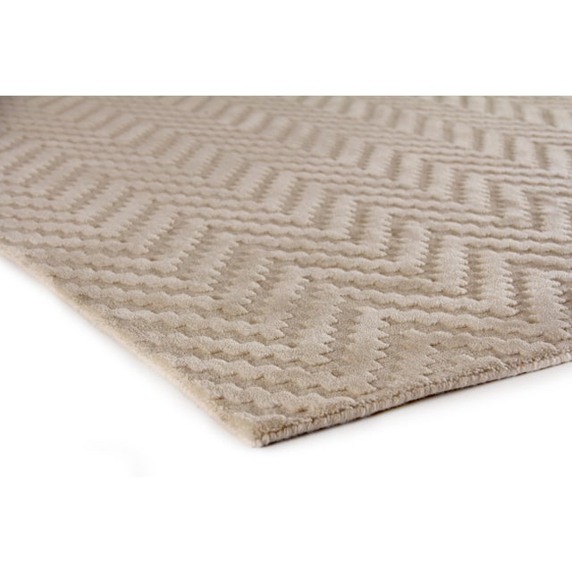 An everlasting classic! The sharp angles of the textured chevron pattern create the sleek, geometric motif of the beloved...